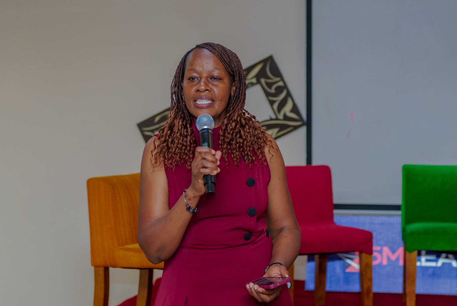 A panellist speaking on stage at the 5M Leadership launch